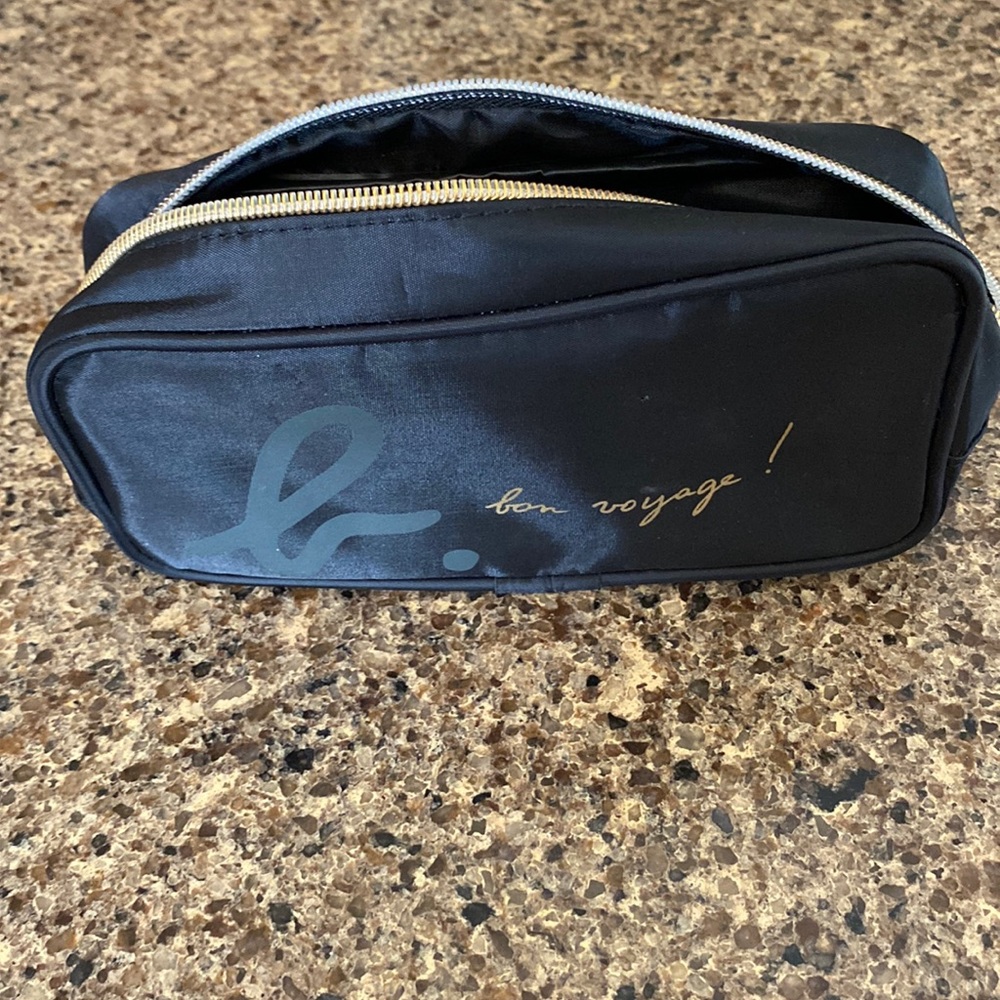 Agnes B. Cathay Pacific cosmetic bag